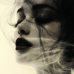 Close-up of a woman’s face illuminated softly, surrounded by flowing smoke or hair, embodying serenity, femininity, and the fleeting nature of beauty.