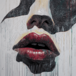 A striking abstract face with bold black and white contrasts, glossy lips, and dripping paint, symbolizing fluidity and emotional depth.
