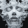 A haunting face emerging from swirling mist, rendered in soft whites and grays, set against a dark background, symbolizing transformation and the transient nature of emotions.